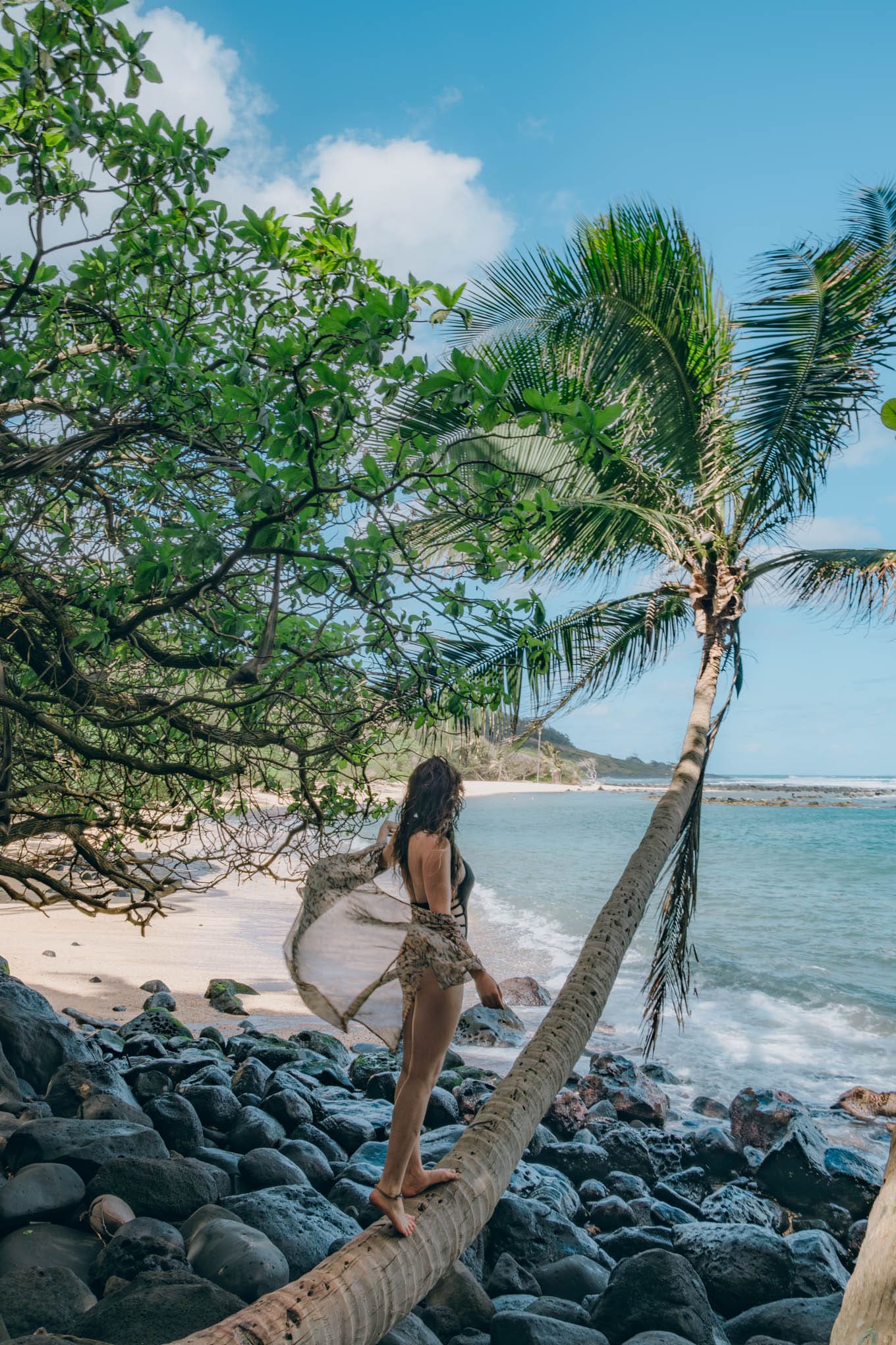 girl on the beach in kauai